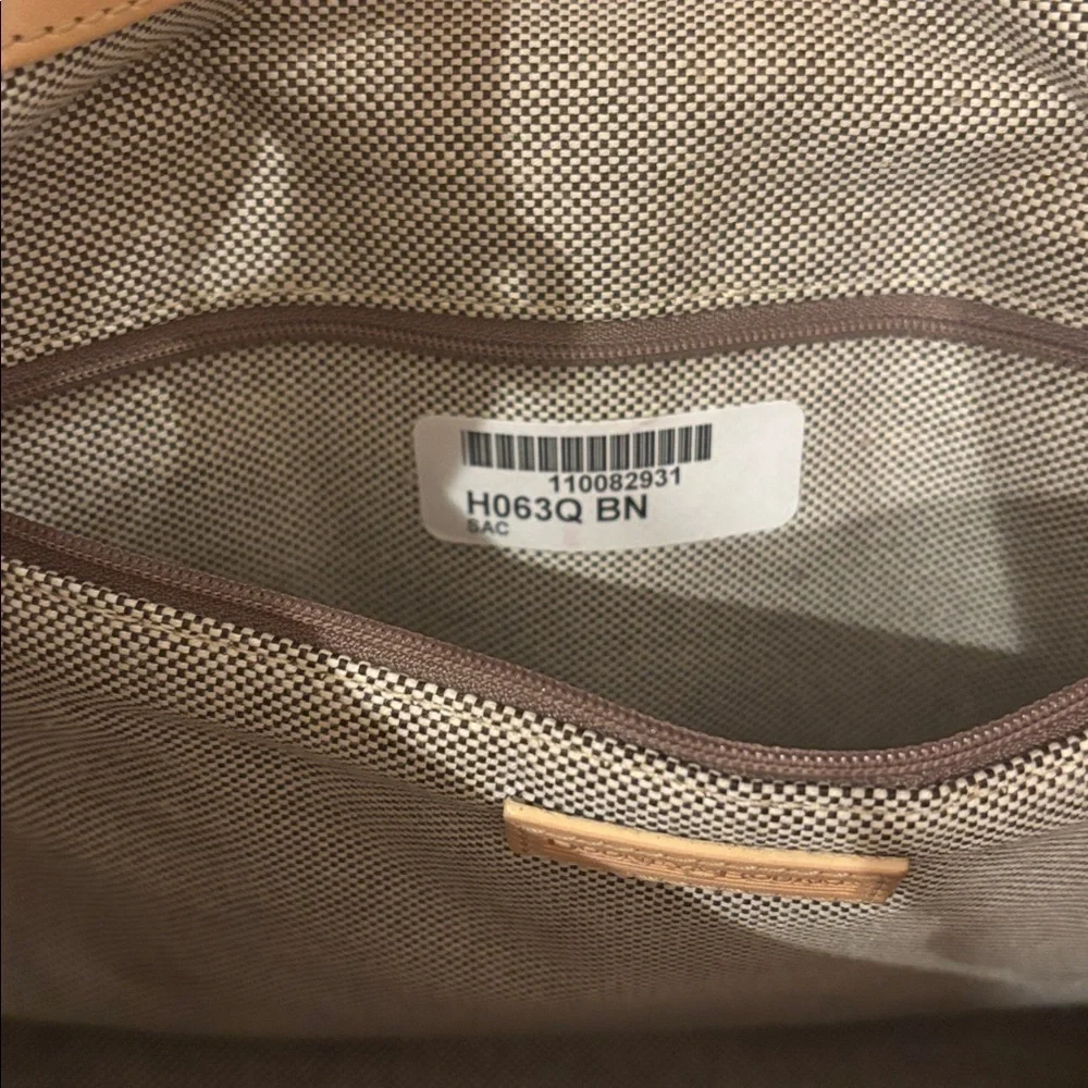 Dooney & Bourke Brown Monogrammed Women's Bucket Hobo Bag